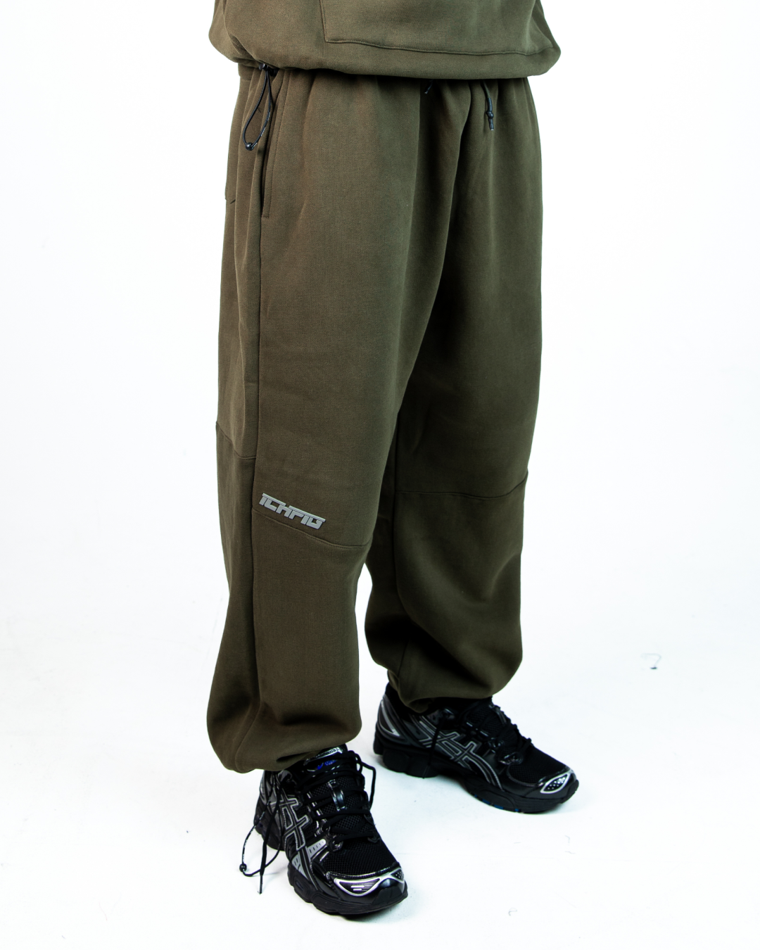 Strike Shot Cord Track Pants - Dark Olive